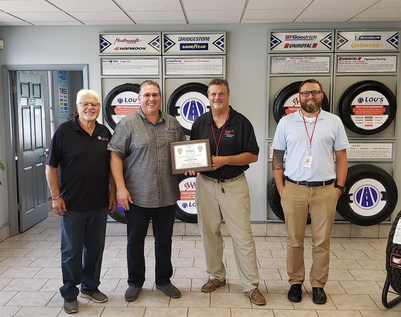 Lou Sr. & Lou Jr. accepting AAA Top Shop Award | Lou's Car Care Center, Inc.